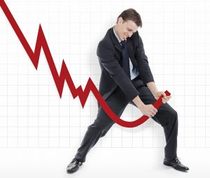 Man trying to moving a chart Man trying to compensate the losses by pulling up the charts.